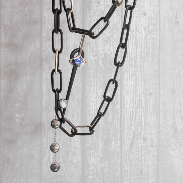ART.30 - Ebony, silver leaf, and balls Hawkeye necklace. Ebony, silver with lapis lazuli heart removable brooch
